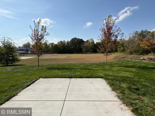 Open patio off the dining room ideal for outdoor entertaining. Great view overlooking the community park and green space.
