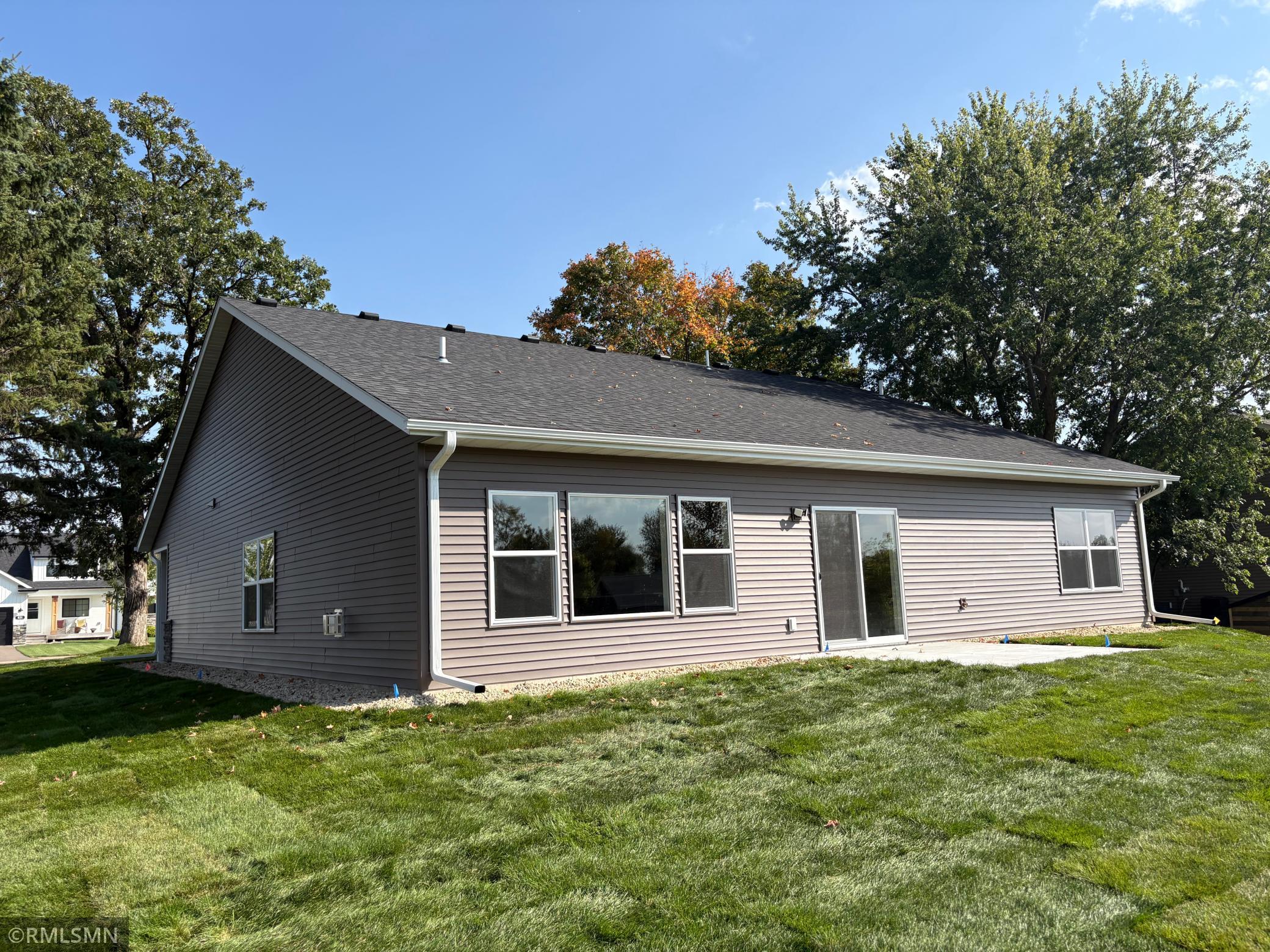 The mature treed lot is now complimented with the beautiful new home. Yard was sodded and has a sprinkler system. 2 new trees were added to the rear yard.