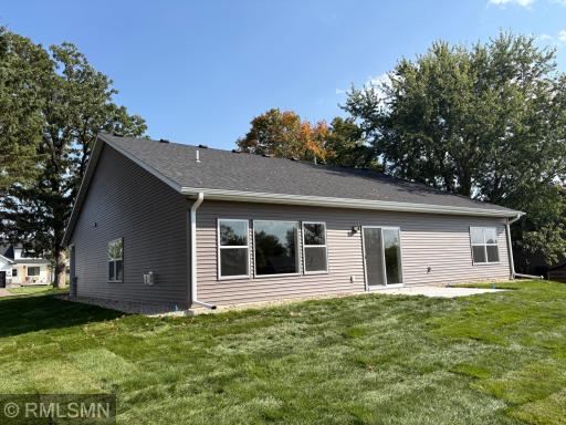 The mature treed lot is now complimented with the beautiful new home. Yard was sodded and has a sprinkler system. 2 new trees were added to the rear yard.
