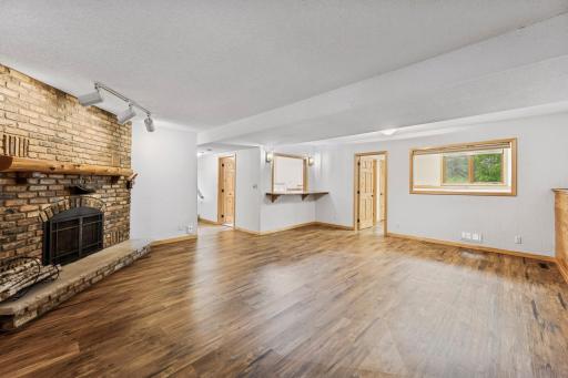 Lower-Recreation Room With New Luxury Vinyl Flooring