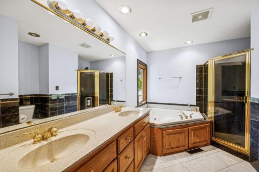 Primary-Private Bathroom With Double Sinks & Large Tub