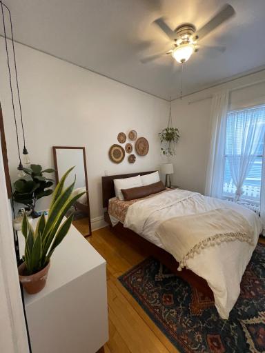 Main level bedroom #2 with previous tenants furniture