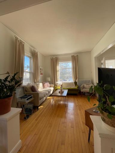 Living room with previous tenants furniture
