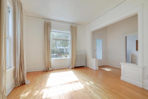Large windows allow natural light to fill the property