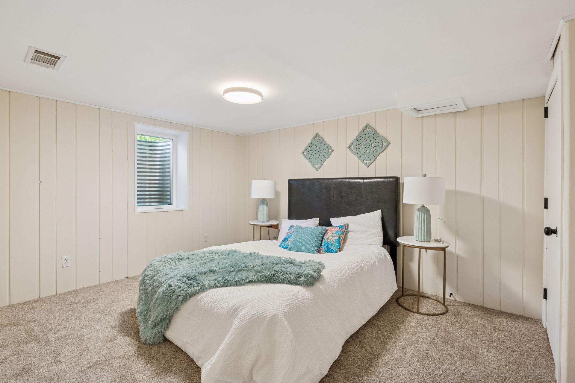 Lower level bedroom with egress window