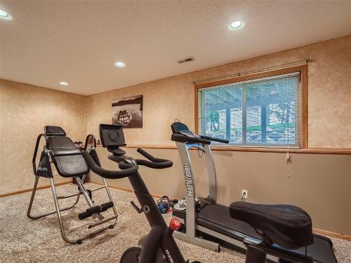5588 Kalenda Drive NE - MLS Sized - 016 - 19 Lower Level Family Room.jpg