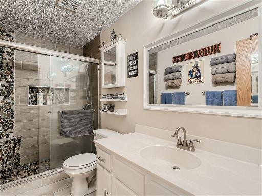 5588 Kalenda Drive NE - MLS Sized - 018 - 21 Lower Level Bathroom.jpg
