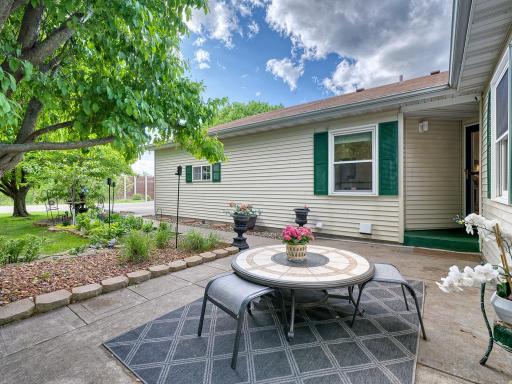 This three bedroom, three bath twin home has a spacious patio area leading you to the front entrance of the home.