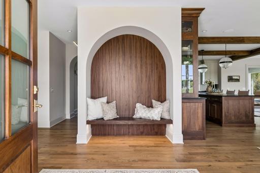 Custom Walnut Entry Nook with Arched Detail