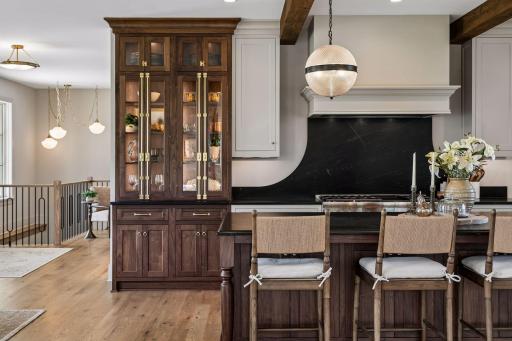 Elegant glass-front cabinetry adds character