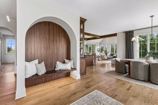 Custom Walnut Entry Nook with Arched Detail