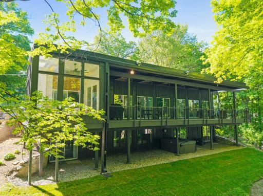 Floor to ceiling windows, mid-century charm
