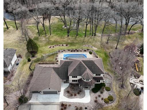 Aerial front of house, huge lot with pool.