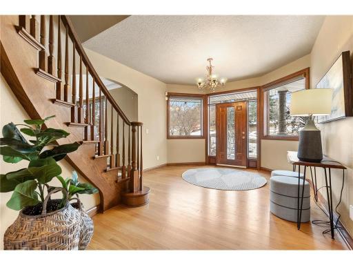 Spectacular entry with hardwood floors and spiral stairs...