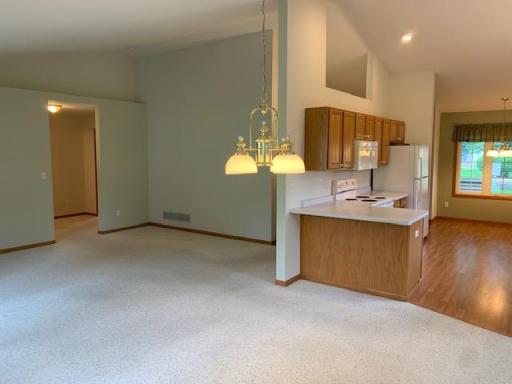 View from dining area towards living room and kitchen