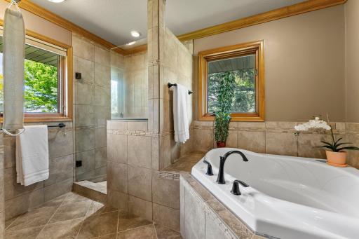 Classic Tile with Luxury Soaking Tub and Two Windows.