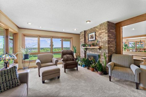 Beautiful green views to the south and the blue water views of Union Lake. Quality details are evident in the crown molding, recessed lighting, windows, and new carpeting.