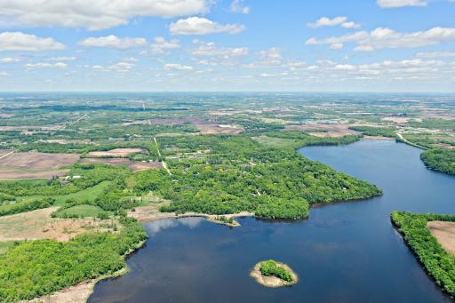 A view of Union Lake, facing away from the home. The small island makes a great spot to kayak around or stop to rest!