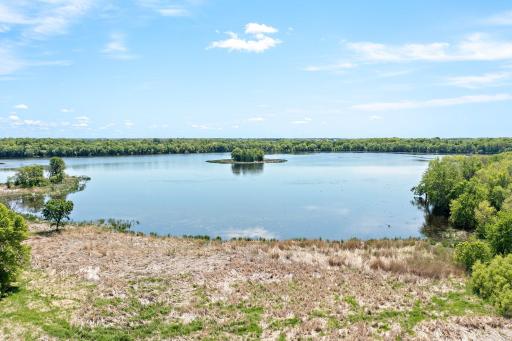This photo shows your lakeshore on Union Lake with the Island in View. You can put in a dock if you wish.