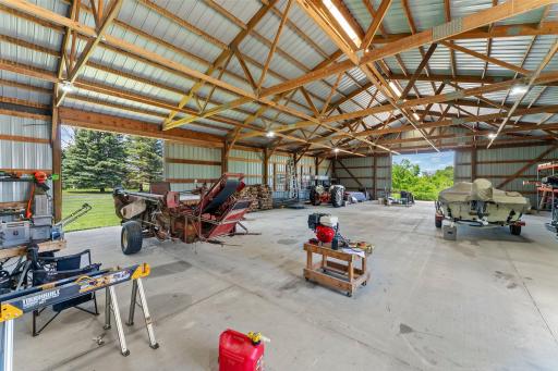 Pole Barn with Concrete Flooring, Good Lighting and Multiple Doors for Air Flow and Convenient Drive in Access.