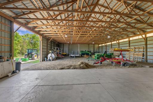 Second Pole Barn has some concrete flooring and some dirt flooring, perfect for converting to a horse barn or parking large equipment.