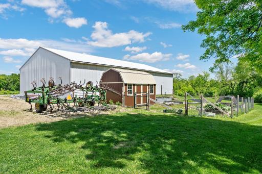 Garden area has a convenient water spigot, and is fenced to keep out the abundant wildlife with small garden shed for storing supplies.