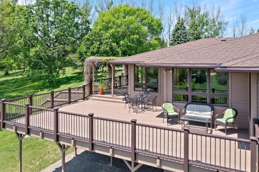 Spacious deck wraps around the southwest wing of the home, and provides beautiful afternoon sun.