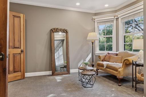 The spacious sitting room completes the large owner's bedroom.