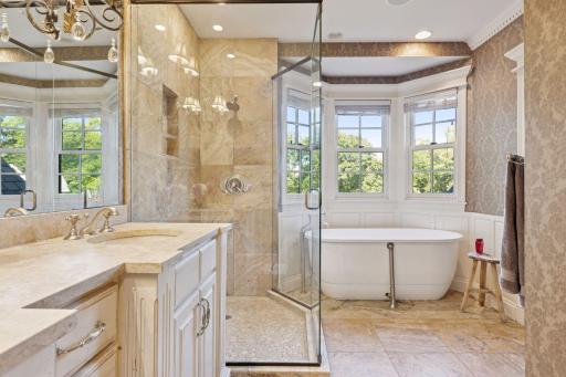 Separate bathtub and large walk-in shower.