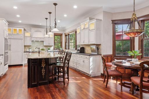 Huge center island with massive granite countertop.