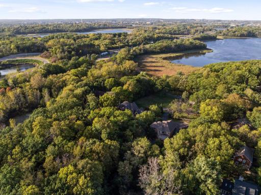 Serenity meets luxury in this private wooded location.