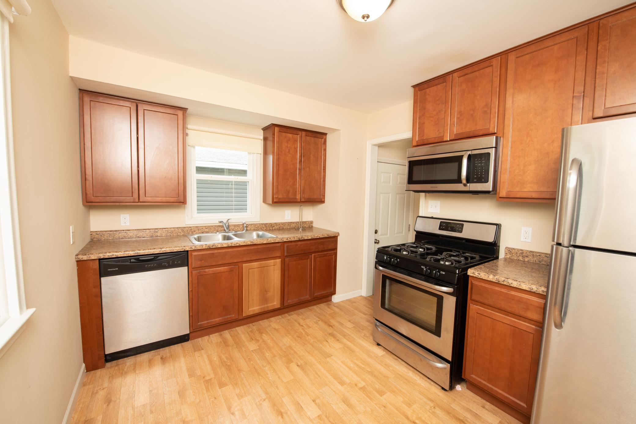 Kitchen with stainless steel appliances.