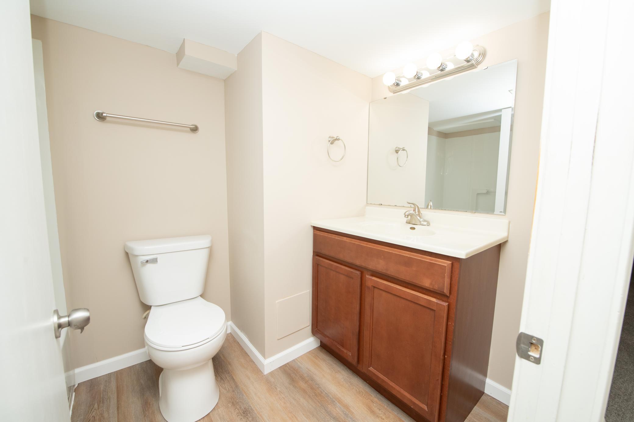 Basement full bath-new flooring fresh paint
