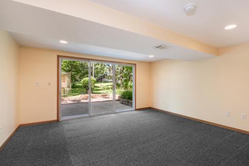 walkout family room to the gorgeous back yard