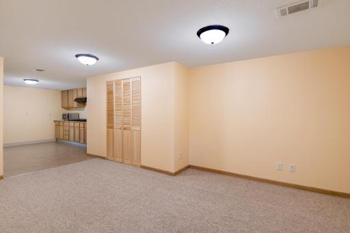 Large bonus/flex space open to lower level kitchen