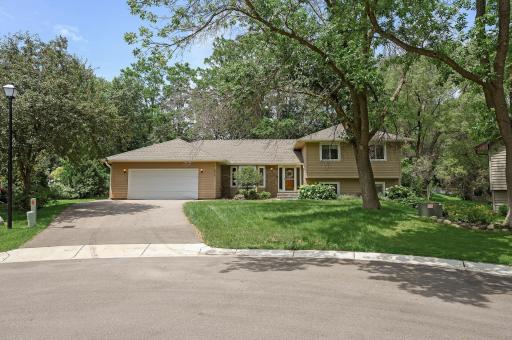 Front of the home located on a quiet cul-de-sac with a welcoming entrance.