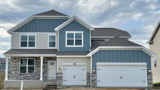 Charming exterior with James Hardie siding, ample stonework & spacious front porch. Driveway, irrigation, sod and trees per plan, included in price! Visit today to see for yourself!