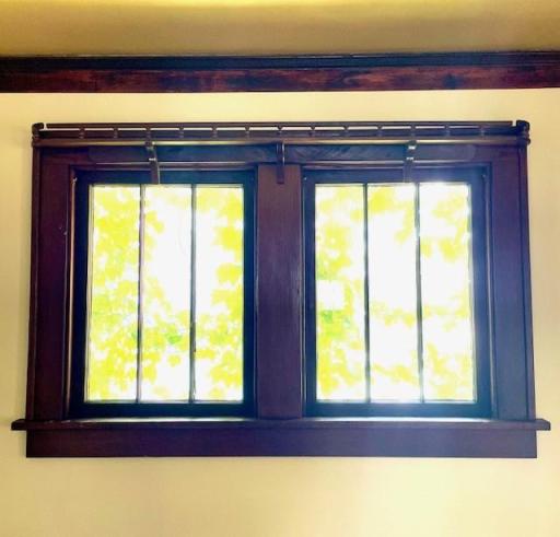 Living room window with decorative plate rail