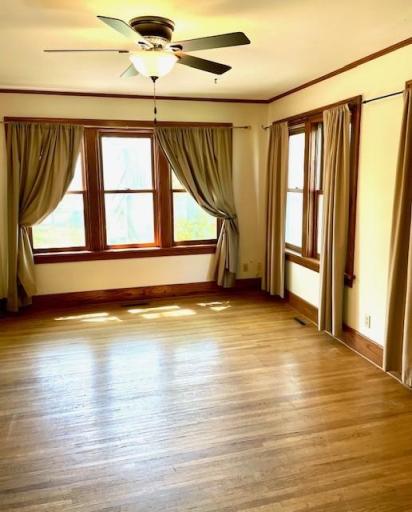 Spacious and bright main floor family room with hardwood floors throughout the main level