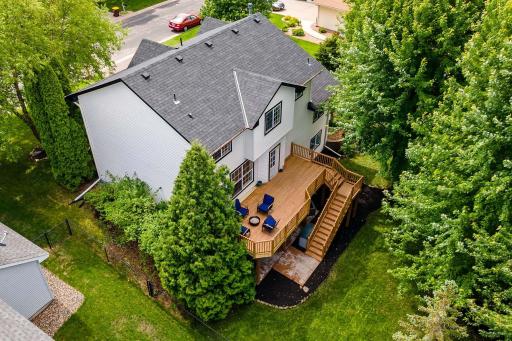 Enjoy the large brand new deck overlooking fenced in yard with mature trees and a chicken coop