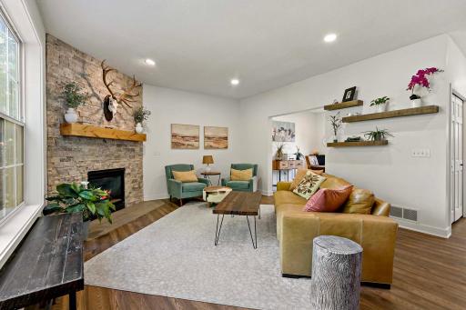 Cozy main level living room, perfect for hosting family and friends!
