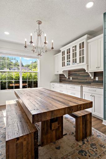 Beautiful dining room with built in storage and counters