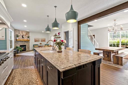 Fully renovated kitchen with large island and open to living and dining rooms
