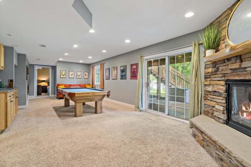 Walkout lower level with wet bar and fireplace