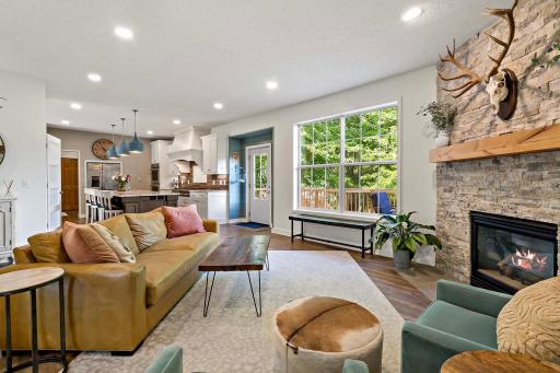 Cozy living room with views of the mature trees in the back yard