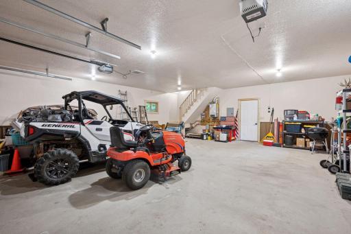 Main level in 30 x 28 wide garage with heat tubes, hot water running through concrete floor for winter comfort.