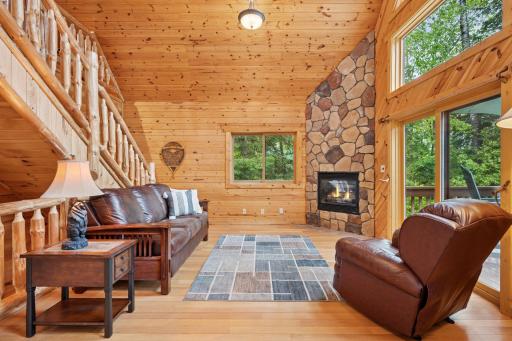 Living room with gas fireplace. Furniture is available too!