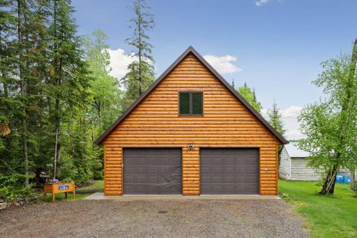 Amazing garage with heat AND AIR! Measures 30ft. x 28ft. Also has tubed heat runs in concrete for winter warmth. Bonus Bunk House in upper level offers tons of sleeping room or flex space.