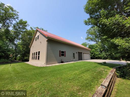 Tucked away in the woods on a spacious 1.8-acre lot, this modern barndominium offers the perfect blend of privacy, style, and functionality.