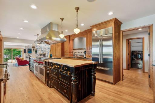 Some factoids: top-end Sub Zero fridge;/freezer chest; a 6-burner Wolf range with both a griddle and a grill; 40 lineal ft of counter space---and 20' of floor-to-ceiling window views.